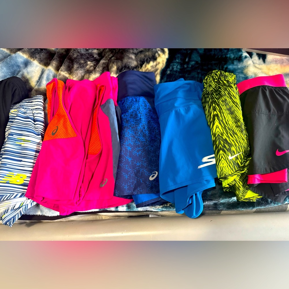 Bundle of 5 running shorts. Nike,asics,Skechers and new balance 1pink asics set.
